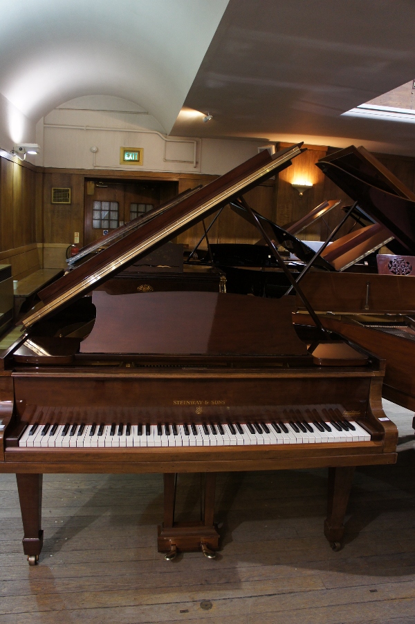 Steinway (c1930) 
A 5ft 7in Model M grand piano in a mahogany case on square tapered legs.