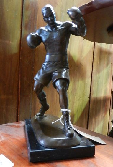 A bronzed Mike Tyson figure