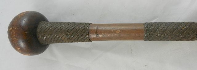 A Zulu knobkerrie, with bulbous top and woven steel wire panels to the shaft