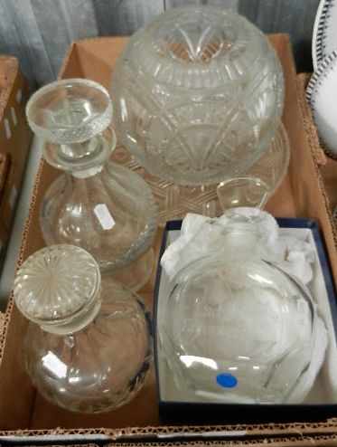 A 19th century hob nail cut glass decanter, another cut glass decanter and a modern decanter with