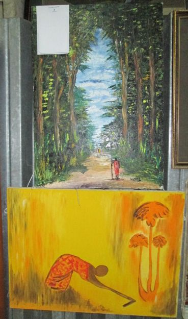 An oil on canvas depicting an African figure on a forest path, signed Michel to lower right,