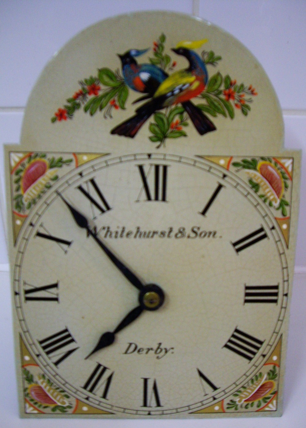 A Whitehurst & Sons of Derby 8-day hook and spike wall clock, the enamel dome top dial with Roman