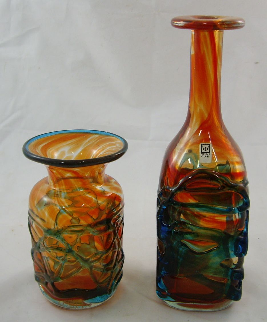 A Mdina glass bottle vase of shouldered square form, with slender neck and flattened rim,