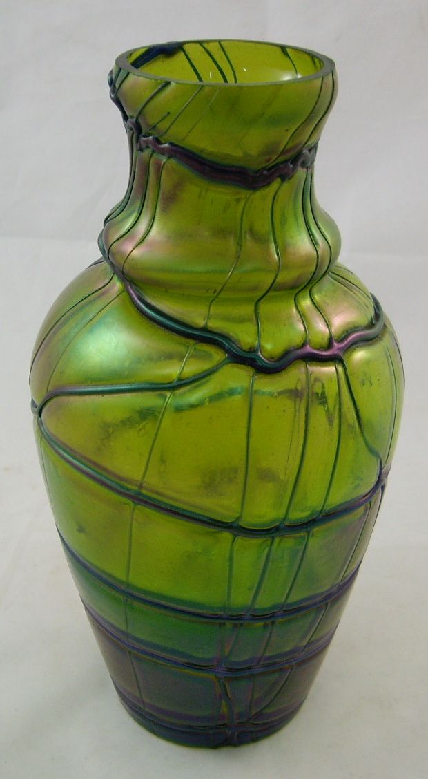 An early 20th century Austrian green iridescent glass vase by Pallme Knoig with waisted neck and