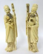 Pair of carved ivory Oriental figures, 29cm