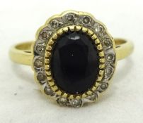 A sapphire and diamond cluster ring, 9K gold, size O
