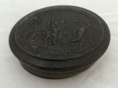Carved horn oval box with scene of figures and landscape