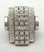 An impressive and fine Art Deco style 18ct white gold large rectangular cluster ring of curved