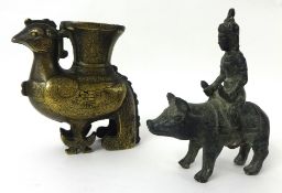 A bronze pig with rider of archaic form with green patination also a Chinese bronze `ritual` vessel