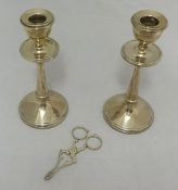 Pair of silver candlesticks with drip trays also a pair silver sugar nips