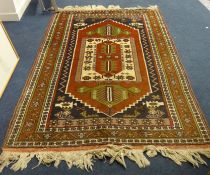 An Eastern floor rug, approx 180cm x 125cm