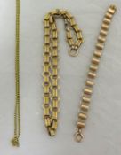 Yellow metal elongated link necklace, unusual Y/M bracelet and another chain