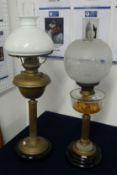 Two tall old brass oil lamps, 72cm high
