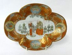 Japanese gilt and shaped dish decorated with figures, 25cm