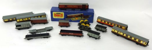 Hornby Dublo 3-rail OO gauge including track, wagons, coaches, two boxed controllers, bridge and