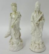 Pair of Chinese white porcelain figures, 24cm (one restored)