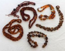 Six Amber necklaces (6)