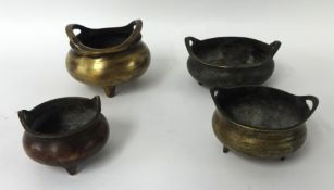 Four Chinese bronze censors with character marks
