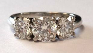 A fine diamond three stone ring approximately 2.22 ct, with copy of insurance valuation from `Cry
