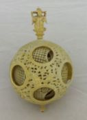 Chinese carved ivory ball containing concentric inner balls, approximately 10cm diameter