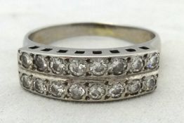 A two row channel set diamond ring in white gold, size P