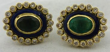 Pair of oval earrings set with central emerald, enamel and old cut diamonds