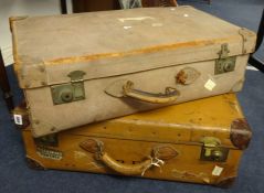 Two old leather luggage cases
