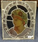 A pair of Art Nouveau style leaded and glass panels (2)