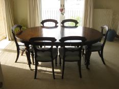 Victorian oak extending dining table and six chairs