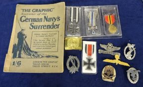 Various German military badges, two Iron Crosses, one Mothers Cross etc and The Graphic Souvenir