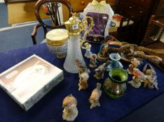 Various items including bird ornaments, claret jug, art pottery etc