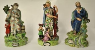 Two 19th century Walton figures `Elijah and Widow` also a similar figure group` Widow and