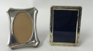 Two miniature silver photo frames including oval, 10cm x 7.5cm