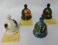 Four Moorcroft year bells, Limited edition of 1000 (one damaged)