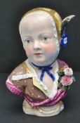 A MEISSEN BUST of a young child wearing a floral painted bonnet,15cm