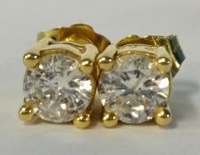 A pair of diamond ear studs, approximately 0.50 ct gross weight