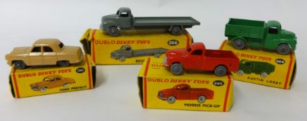 Four Dublo Dinky Toys, boxed, No 64, 65, 66, and 61