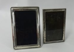 Two silver rectangular photo frames, largest 16cm x 10cm