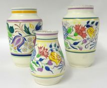 Three Poole pottery vases, tallest 23cm