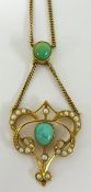 An Art Nouveau style pearl and turquoise pendant set in 15ct gold