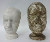 Two plaster `death` masks, the tallest approx 32cm