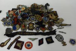 Collection of military cloth patches and some cap tallies