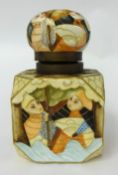 A cuboid porcelain inkwell of Oriental design decorated with various portraits