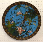 A Japanese Cloisonne plate decorated with birds and flowers, 39cm diameter