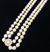 A cultured pearl necklace, approximately 68cm long