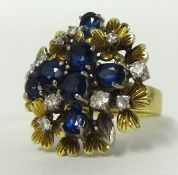 Large 14k cluster ring set with diamonds and sapphire, size L