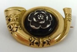 15ct gold brooch of horn design