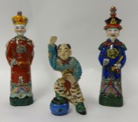 Three Chinese pottery figures, 29cm