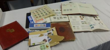 A stamp album with QV to modern commemorative stamps and other general albums and stock books
