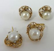 Pearl ring, earrings and pendant set in yellow metal
